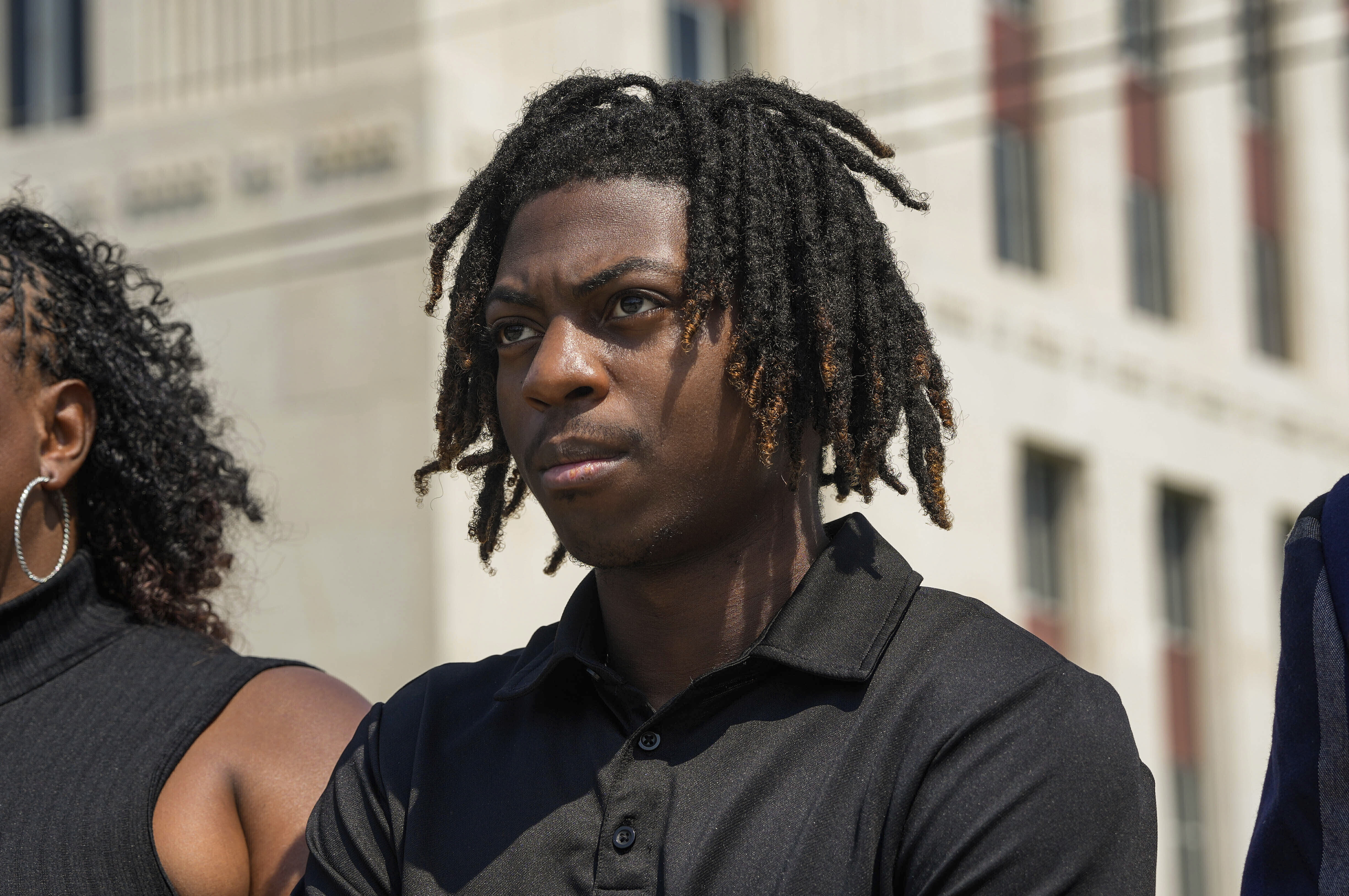 FILE - Darryl George stands next to his mother, Darresha George, in front of Galveston County Court House, May 23, 2024, in Galveston, Texas. (Raquel Natalicchio/Houston Chronicle via AP, File)