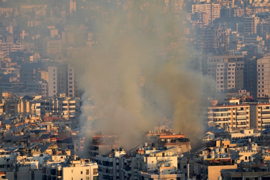 Smoke rises from an Israeli airstrike in the southern suburbs of Beirut, Lebanon, Saturday, Sept. 28, 2024. (AP Photo/Hussein Malla)