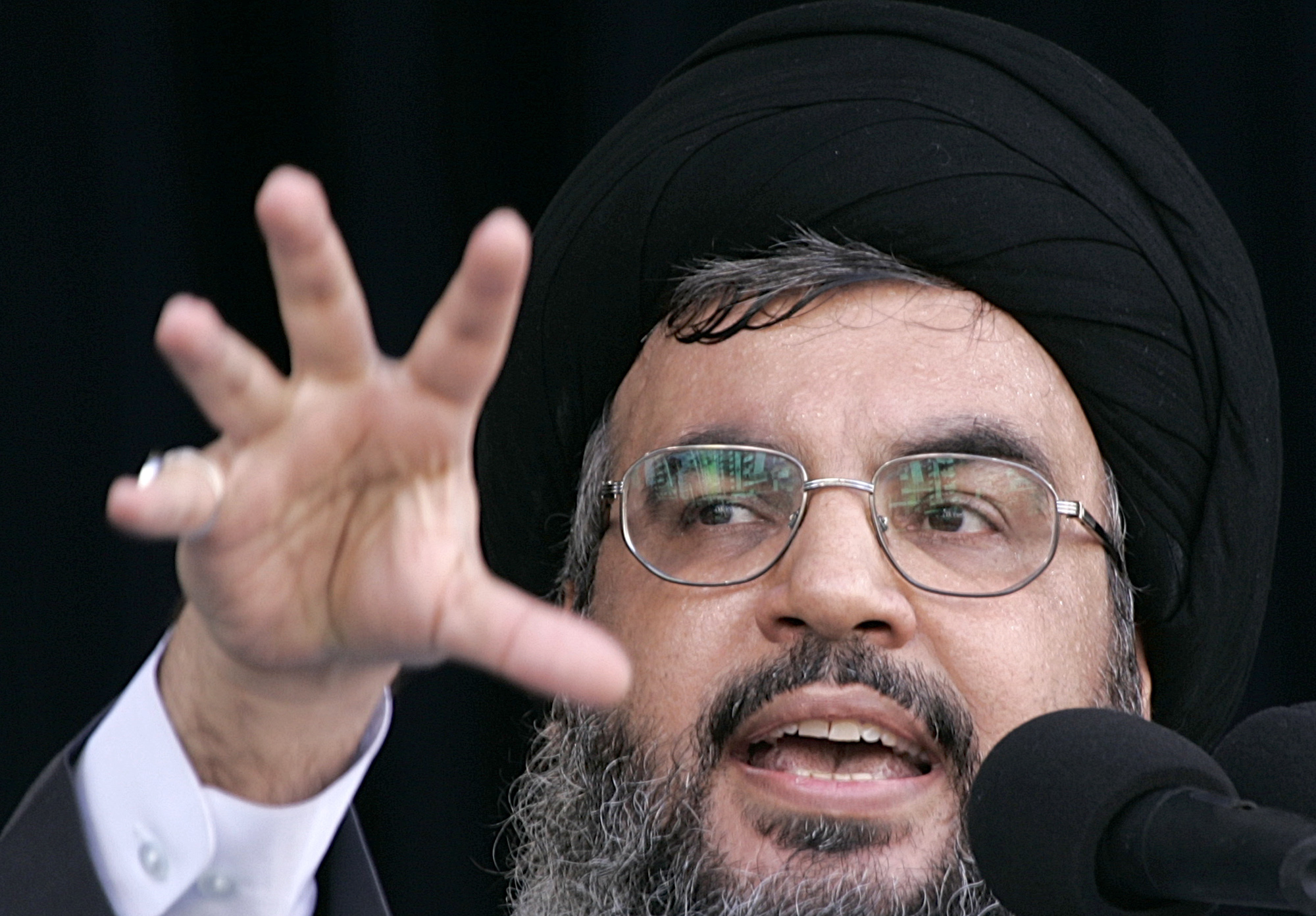 FILE - Hezbollah leader Hassan Nasrallah, delivers a speech during the annual rally to mark Al-Quds Day, Jerusalem Day, in the southern suburbs of Beirut, Friday, Oct. 28, 2005. (AP Photo/Hussein Malla, File)