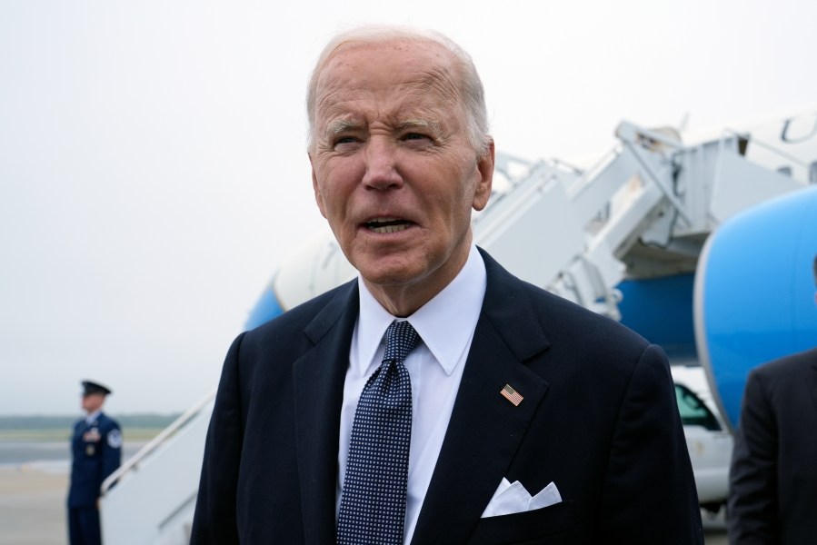 President Joe Biden speaks the the media after stepping off Air Force One at Dover Air Force Base in Delaware, Friday, Sept. 27, 2024, to spend the weekend at his beach home in Rehoboth Beach, Del. (AP Photo/Susan Walsh)