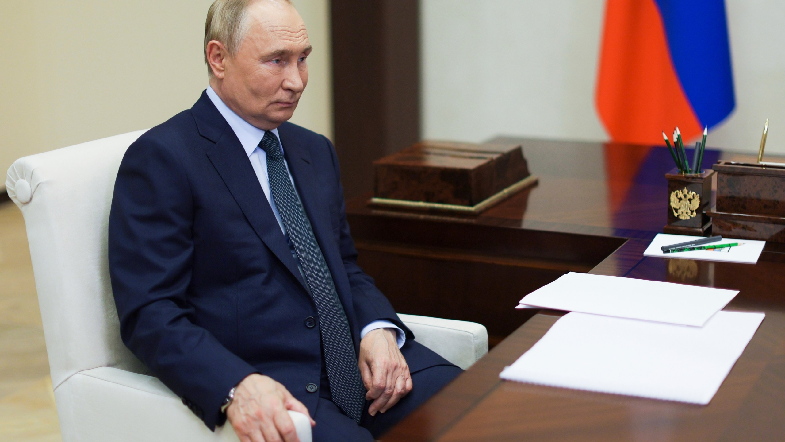 Russian President Vladimir Putin speaks with the head of Russian state space corporation Roscosmos Yuri Borisov during their meeting at Novo-Ogaryovo state residence outside of Moscow, Russia, Friday, Nov. 15, 2024. (Vyacheslav Prokofyev, Sputnik, Kremlin Pool Photo via AP)