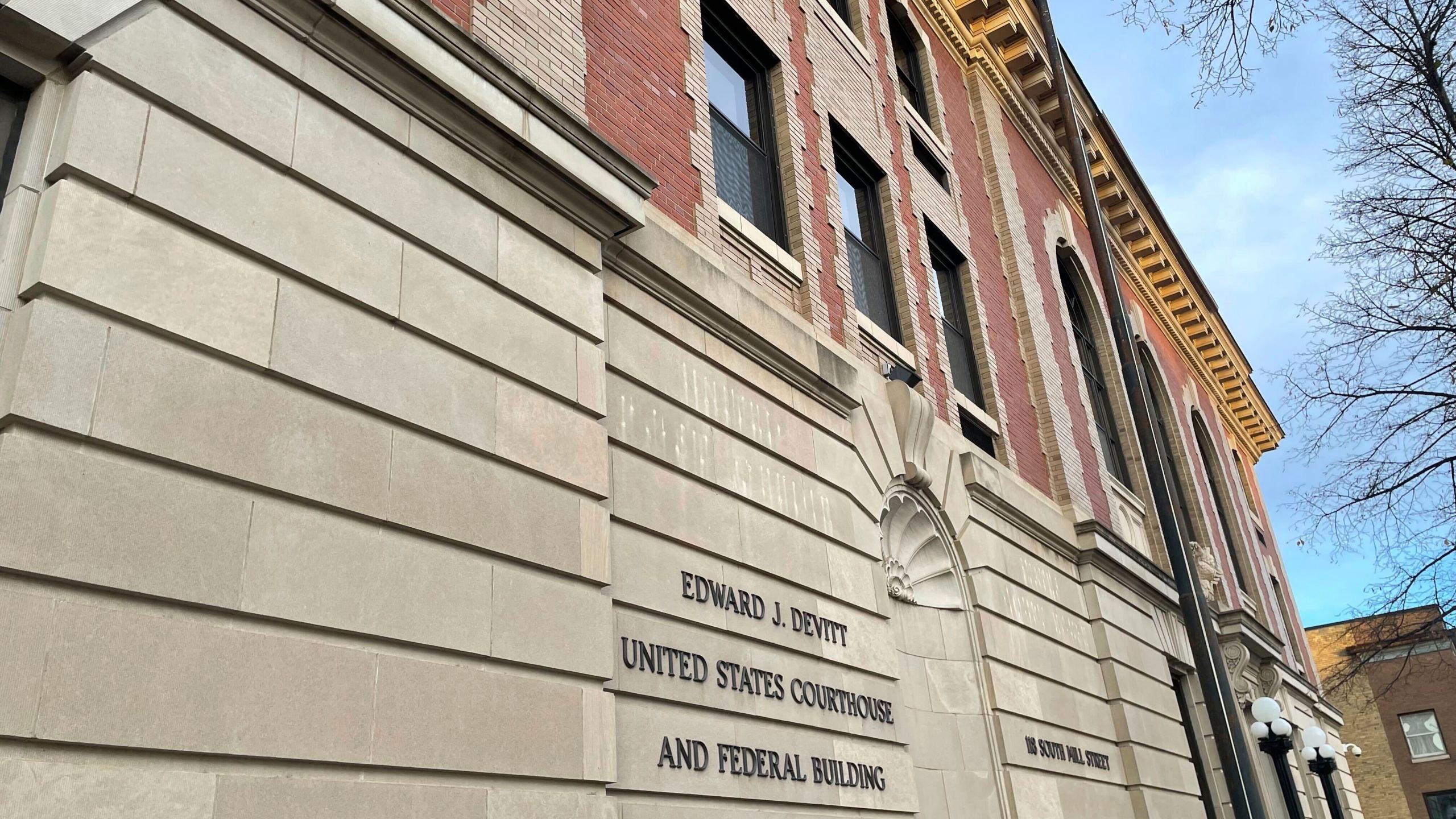 The Edward J. Devitt U.S. Courthouse and Federal building is seen, where two men on trial face human smuggling charges, Monday, Nov. 18, 2024, in Fergus Falls, Minn. (AP Photo/Michael Goldberg)