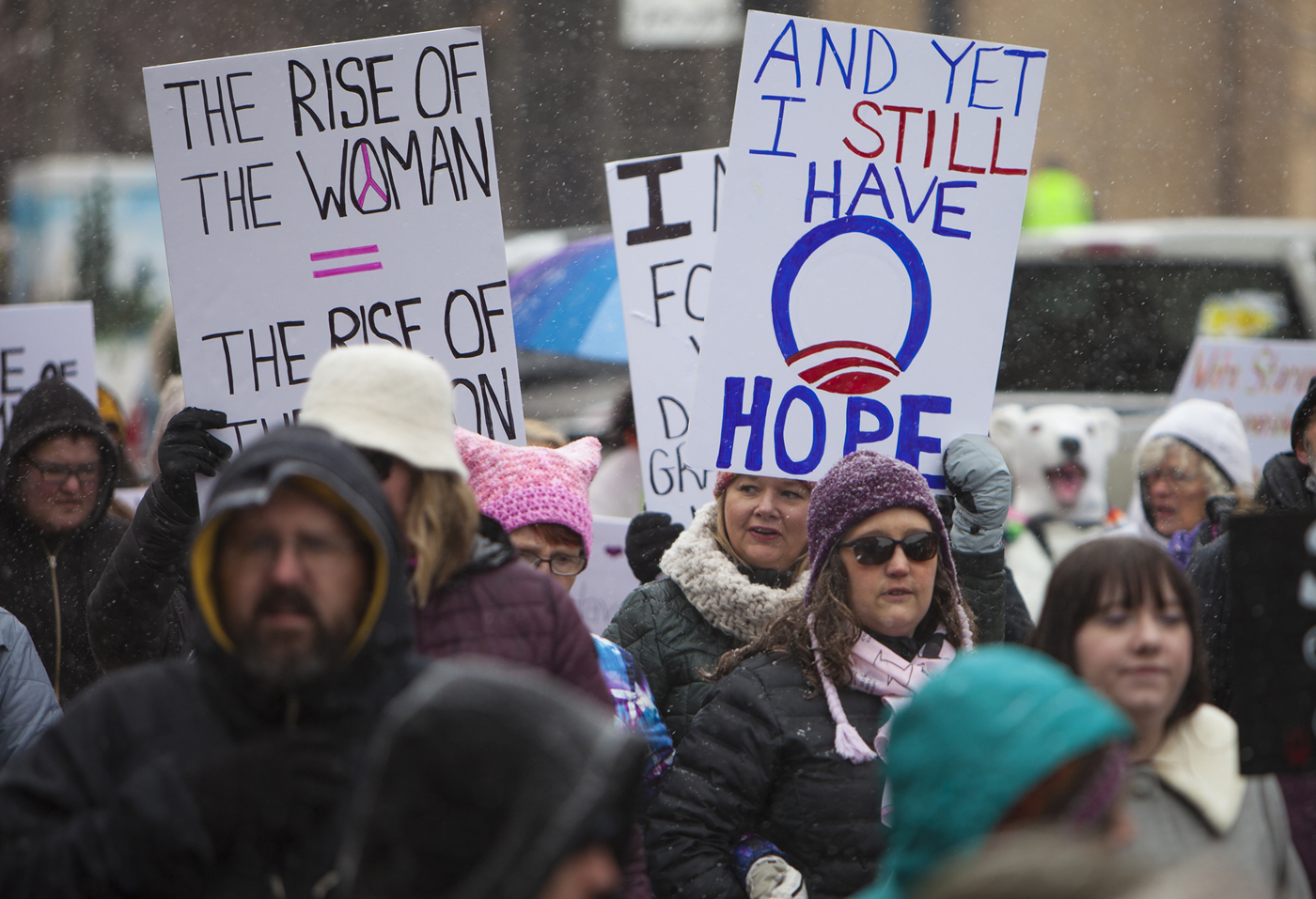 FILE - Protesters wave signs and chant during a Women's March, Jan. 20, 2018, in Casper, Wyo. (Josh Galemore/The Casper Star-Tribune via AP, File)