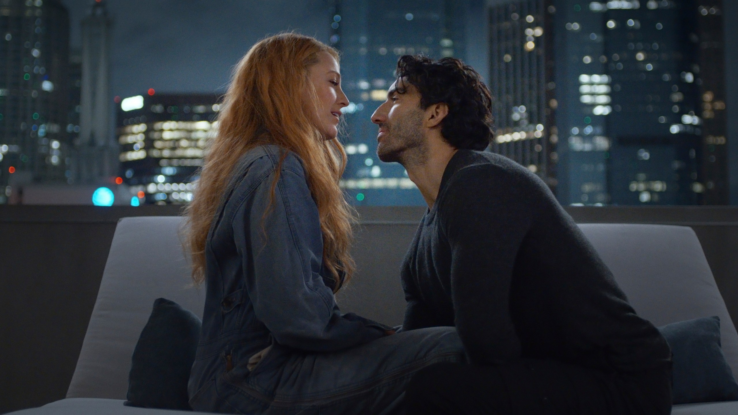 This image released by Sony Pictures shows Justin Baldoni, right, and Blake Lively in a scene from "It Ends With Us." (Nicole Rivelli/Sony Pictures via AP)