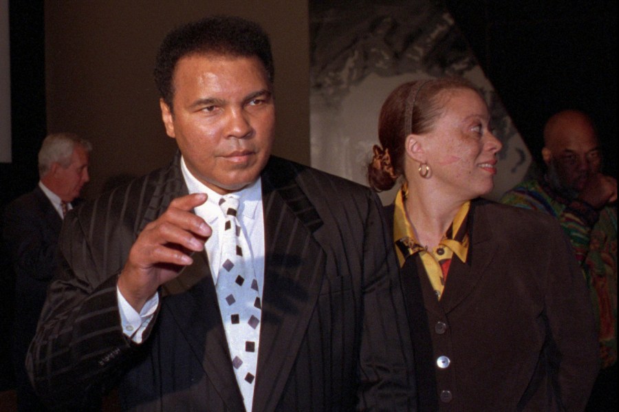 FILE - Muhammad Ali and his wife, Lonnie appear at a premiere for "When We Were Kings" in Louisville, Ky., on Feb. 27, 1997. (AP Photo/Michael Clevenger, File)