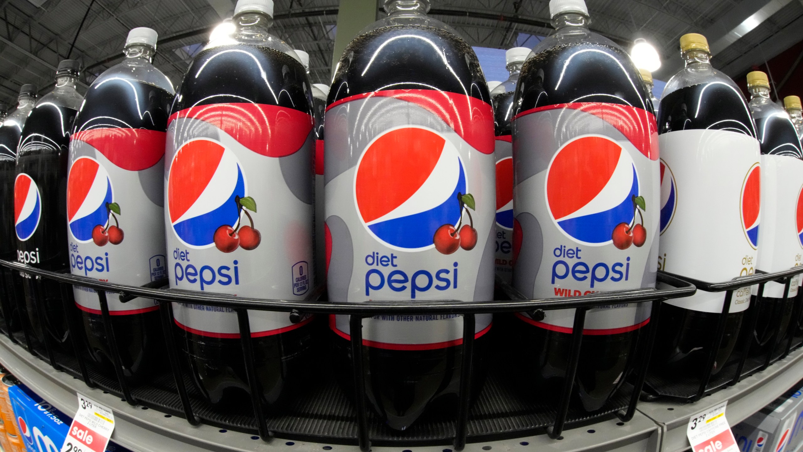 FILE - Bottles of Diet Pepsi Wild Cherry are displayed at a market in Pittsburgh, Jan. 26, 2023. (AP Photo/Gene J. Puskar, File)