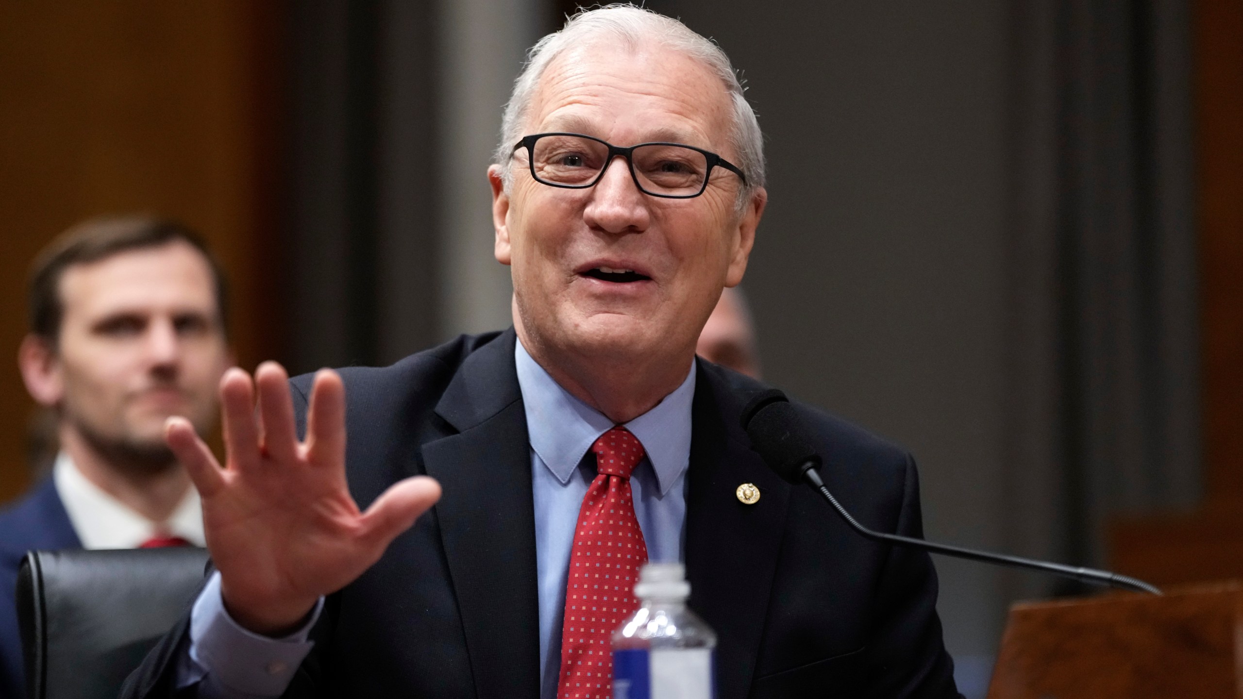 Sen. Kevin Cramer, R-N.D., introduces South Dakota Gov. Kristi Noem, President-elect Donald Trump's nominee to be Secretary of Homeland Security, appearing before the Senate Homeland Security and Governmental Affairs Committee for her confirmation hearing, at the Capitol in Washington, Friday, Jan. 17, 2025. (AP Photo/Ben Curtis)