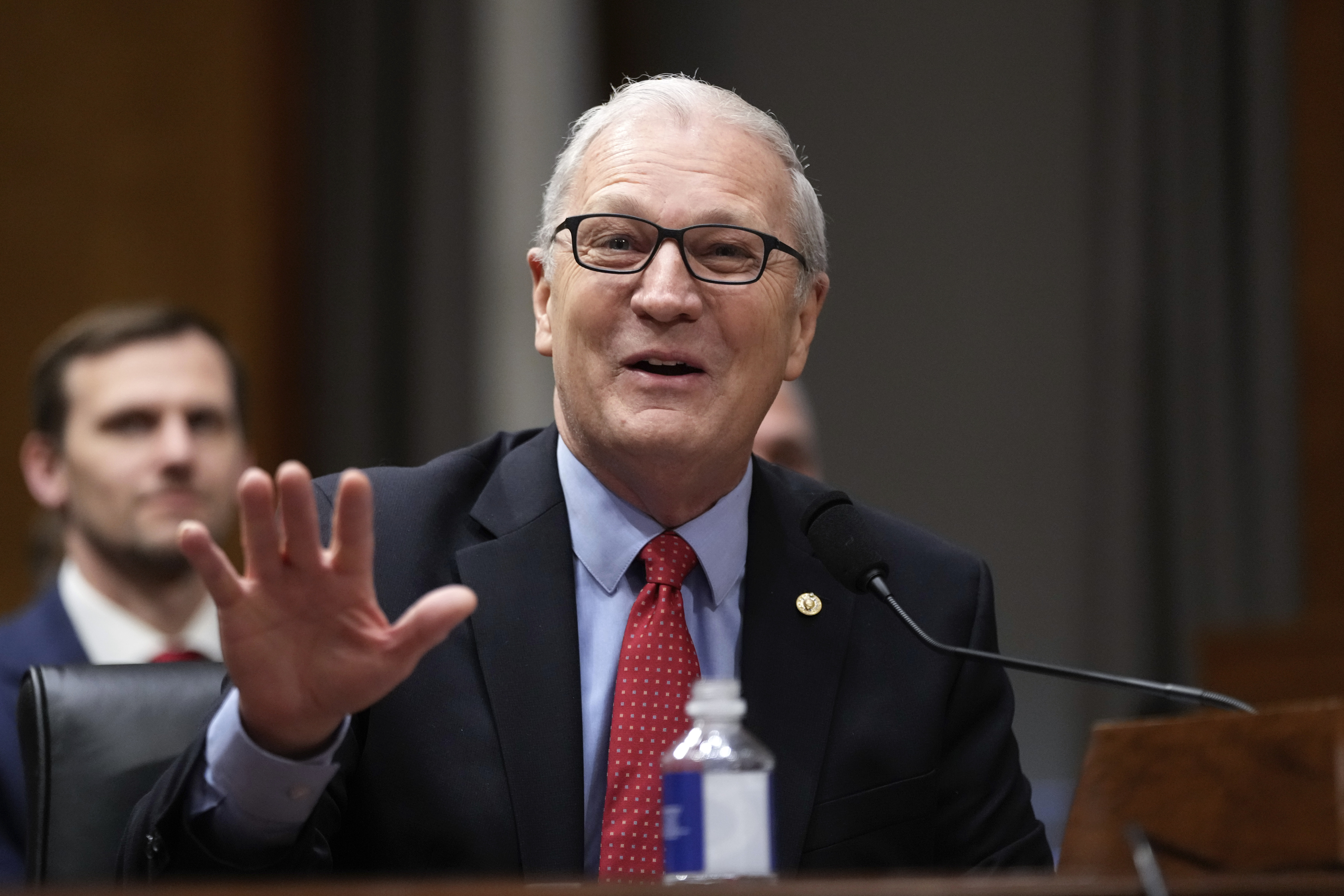 Sen. Kevin Cramer, R-N.D., introduces South Dakota Gov. Kristi Noem, President-elect Donald Trump's nominee to be Secretary of Homeland Security, appearing before the Senate Homeland Security and Governmental Affairs Committee for her confirmation hearing, at the Capitol in Washington, Friday, Jan. 17, 2025. (AP Photo/Ben Curtis)