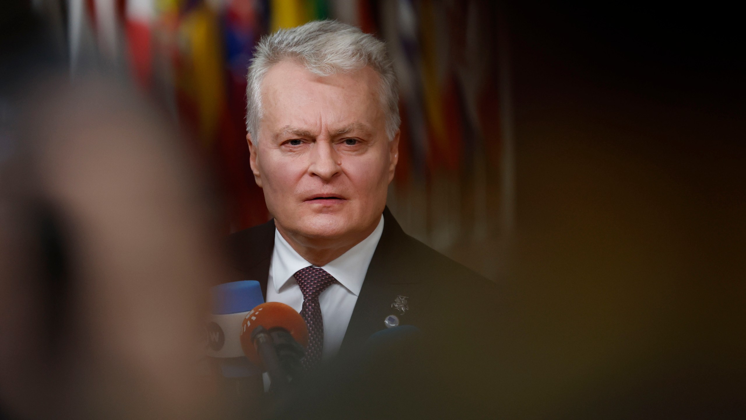 Lithuania's President Gitanas Nauseda speaks with the media as he arrives for an EU summit at the European Council building in Brussels, Thursday, Dec. 19, 2024. (AP Photo/Geert Vanden Wijngaert)