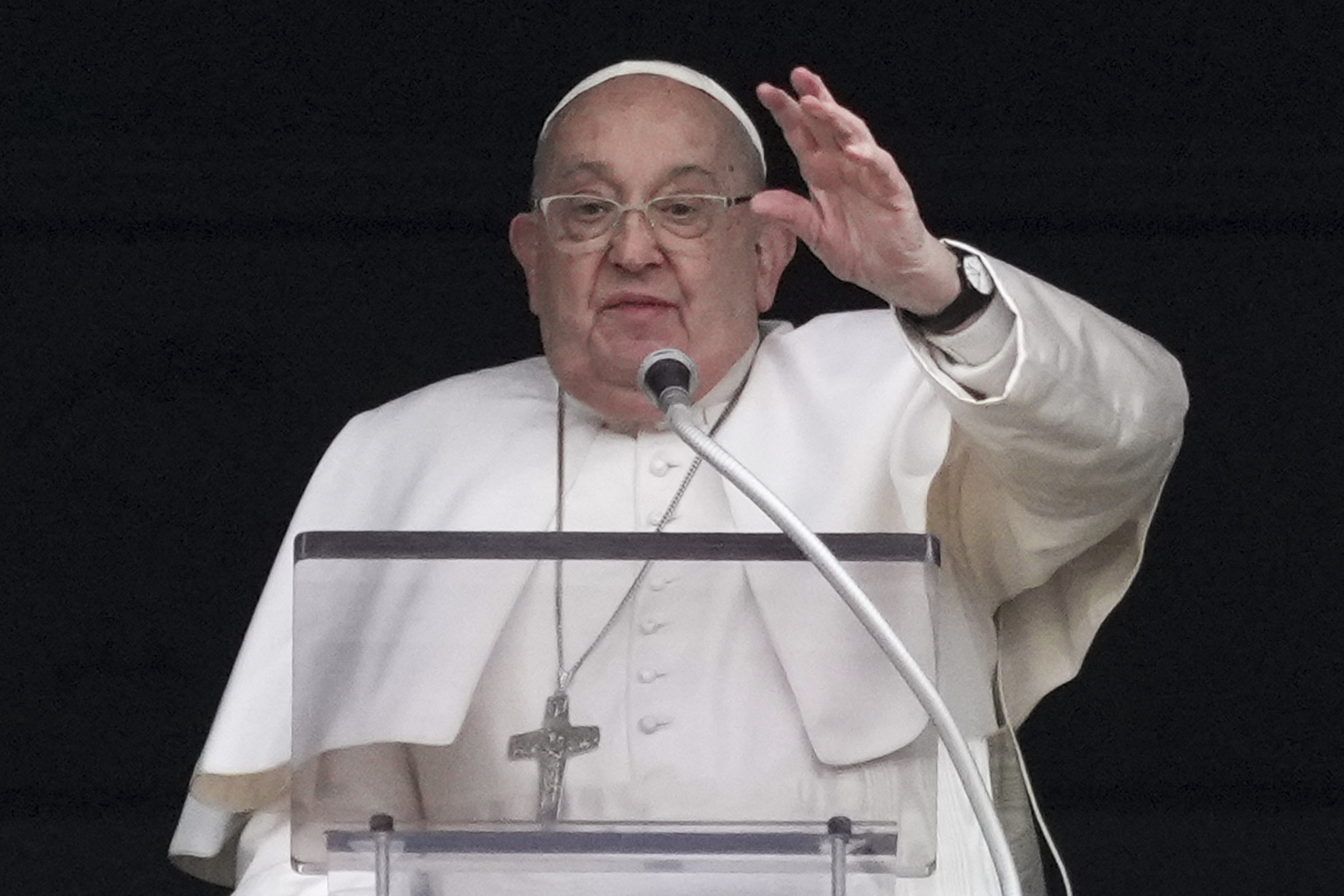 Pope Francis delivers his blessing as he recites the Angelus noon prayer from the window of his studio overlooking St.Peter's Square, at the Vatican, Sunday, Jan. 19, 2025. (AP Photo/Andrew Medichini)