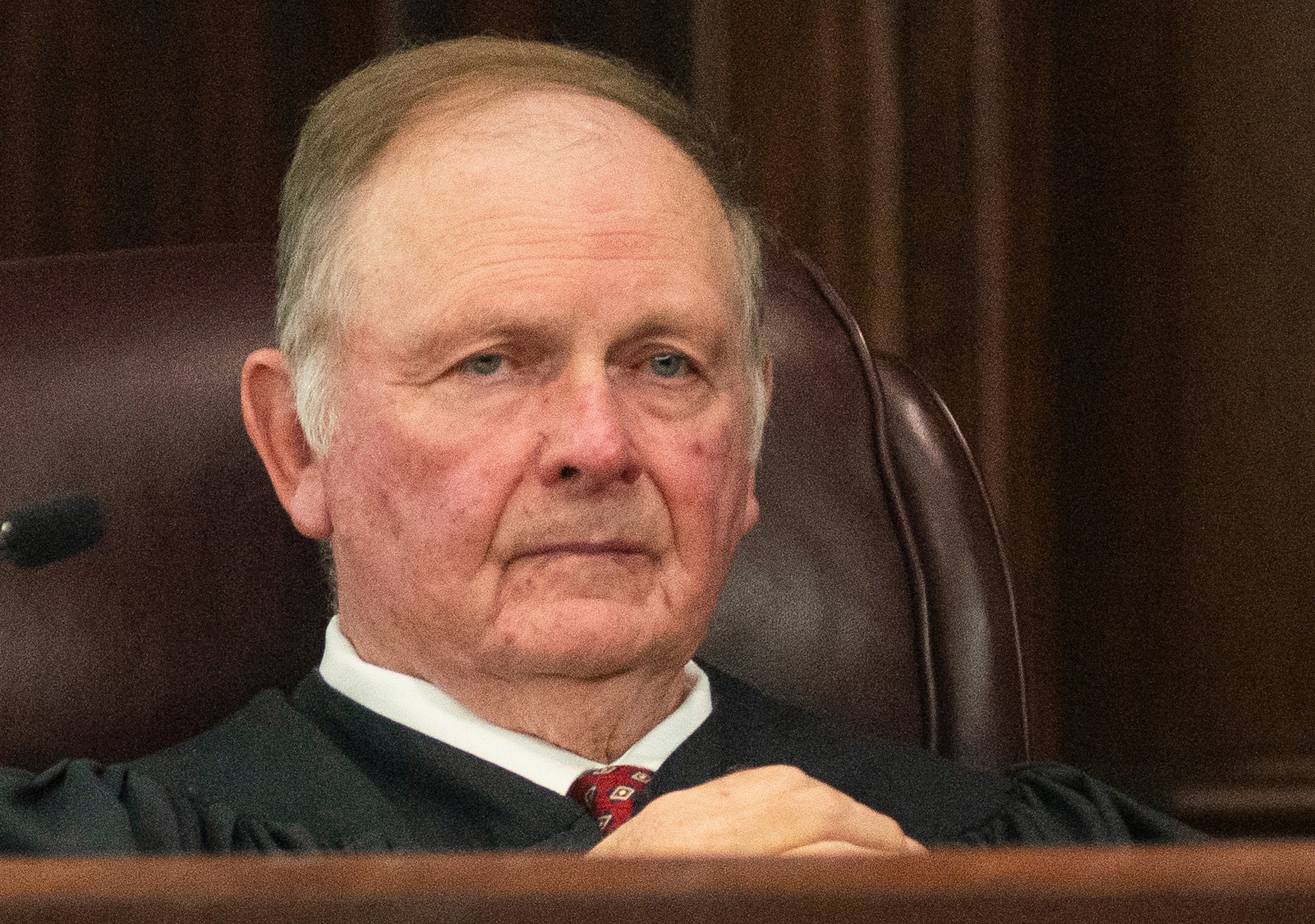 Senior Judge John R. Tuner listens Tuesday, Jan. 28, 2025, in Brunswick, Ga., as prosecutor John Fowler delivers his opening statement in the trial of former Brunswick Judicial Circuit District Attorney Jackie Johnson who is accused of obstruction of justice and violating her oath of office. (Terry Dickson/The Brunswick News via AP, Pool)