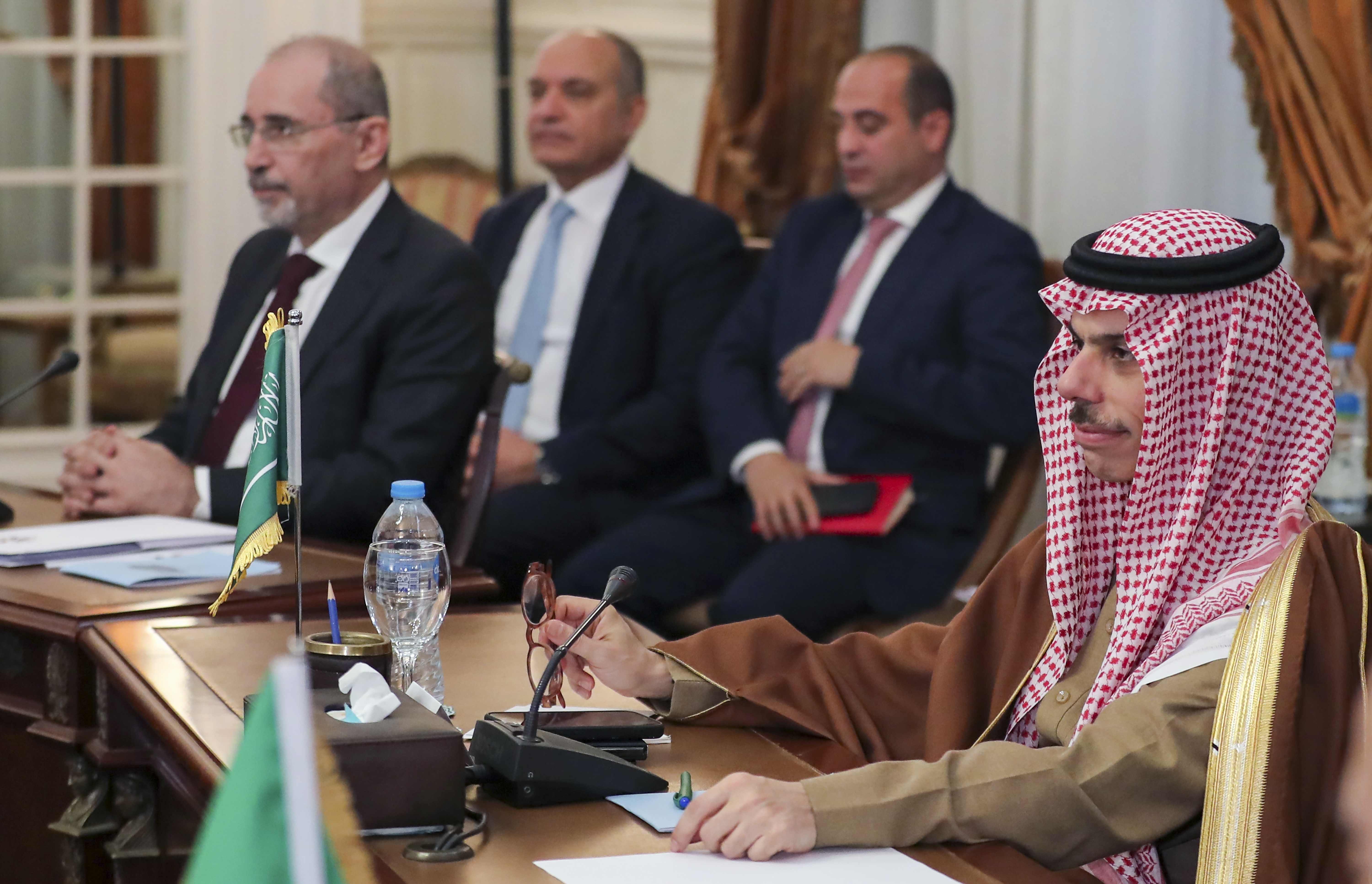 Jordan's foreign minister Ayman Safadi, left,and Saudi foreign minster Faisal bin Farhan attend sa meeting of Arab League foreign ministers in Cairo, Egypt, Saturday, Feb. 1, 2025. (AP Photo/Khaled Elfiqi)