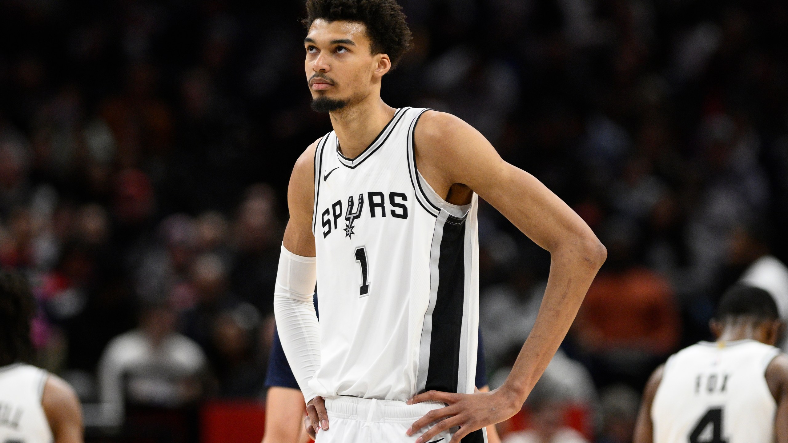 FILE - San Antonio Spurs center Victor Wembanyama (1) looks oon during the second half of an NBA basketball game against the Washington Wizards, Monday, Feb. 10, 2025, in Washington. (AP Photo/Nick Wass, File)