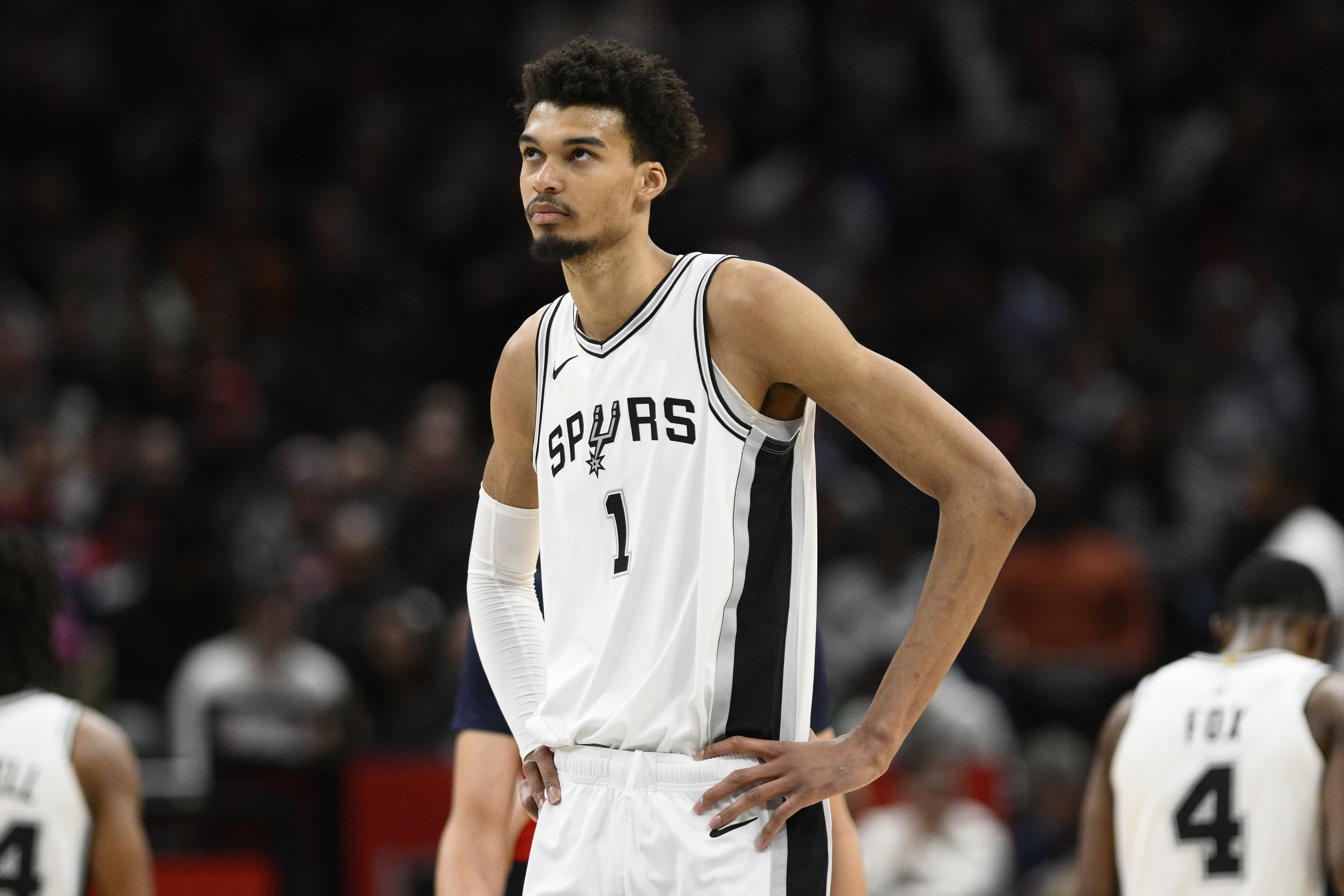 FILE - San Antonio Spurs center Victor Wembanyama (1) looks oon during the second half of an NBA basketball game against the Washington Wizards, Monday, Feb. 10, 2025, in Washington. (AP Photo/Nick Wass, File)