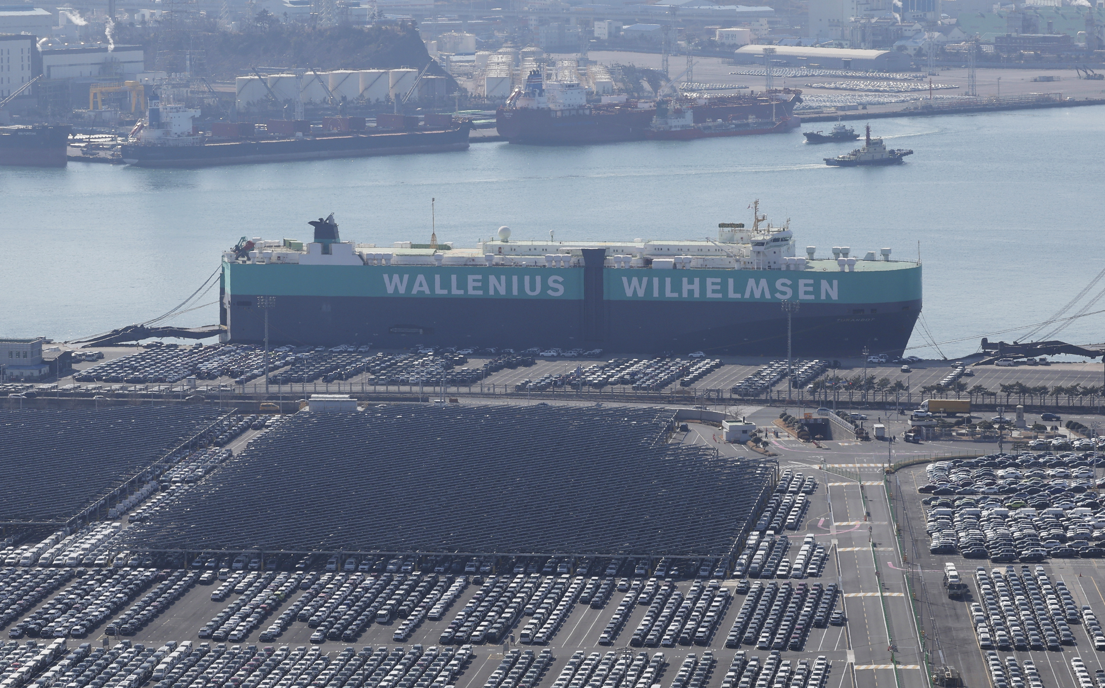 Vehicles are parked to be exported at a port next to Hyundai Motor's manufacturing facility in Ulsan, South Korea, Tuesday, Feb. 11, 2025. (Kim Yong-tea/Yonhap via AP)