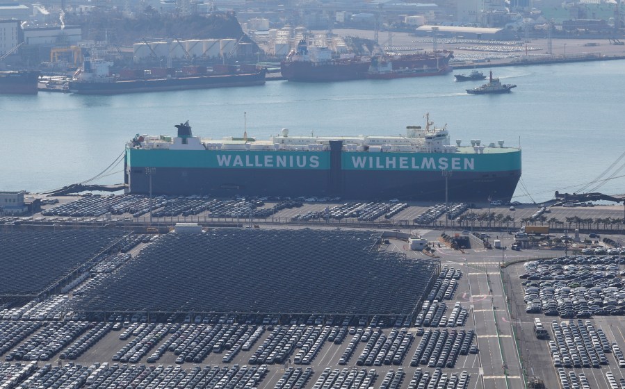 Vehicles are parked to be exported at a port next to Hyundai Motor's manufacturing facility in Ulsan, South Korea, Tuesday, Feb. 11, 2025. (Kim Yong-tea/Yonhap via AP)