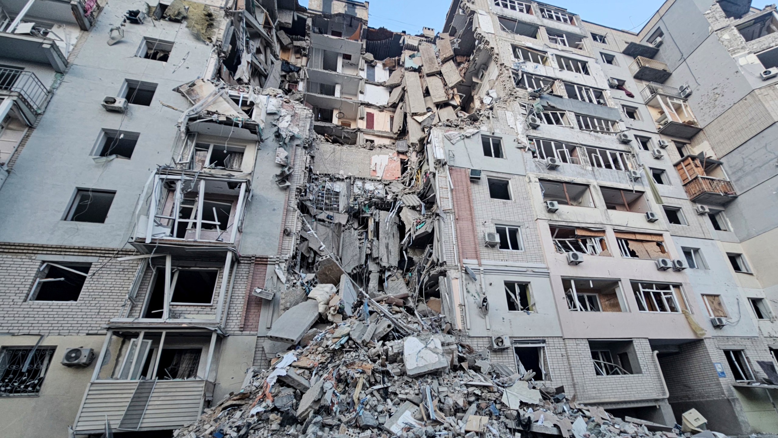 In this photo provided by the Kherson Regional Military Administration on Thursday, Feb. 20, 2025, a building is seen heavily damaged by a Russian strike in Kherson, Ukraine. (Kherson Regional Military Administration via AP)