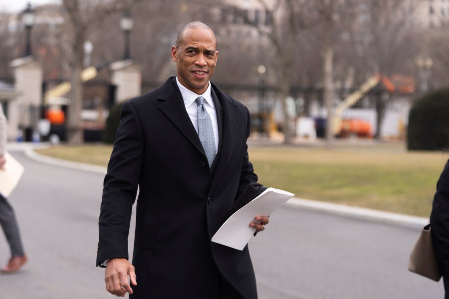 FILE - Housing and Urban Development Secretary Scott Turner, walks towards the West Wing following a TV interview at the White House, Wednesday, Feb. 19, 2025, in Washington. (AP Photo/Manuel Balce Ceneta, File)