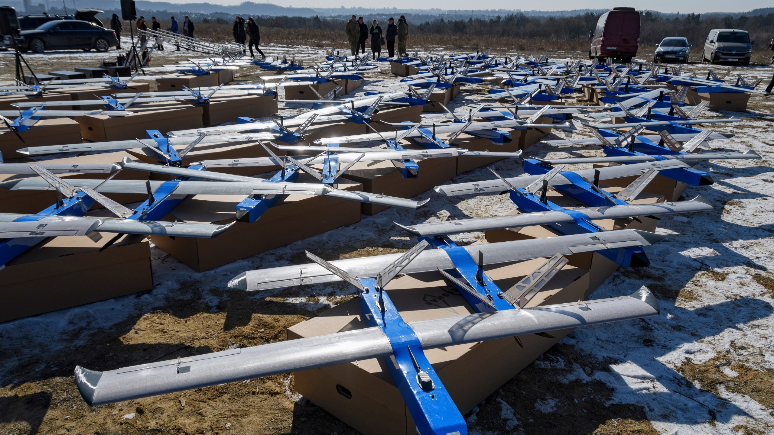 Ukrainian-made fixed-wing Besomar 3210 drone interceptors are handed over to the Armed Forces by Kozytskyi Charity Foundation in an undisclosed location in the Lviv region, western Ukraine, Friday, Feb. 21, 2025. (AP Photo/Mykola Tys)