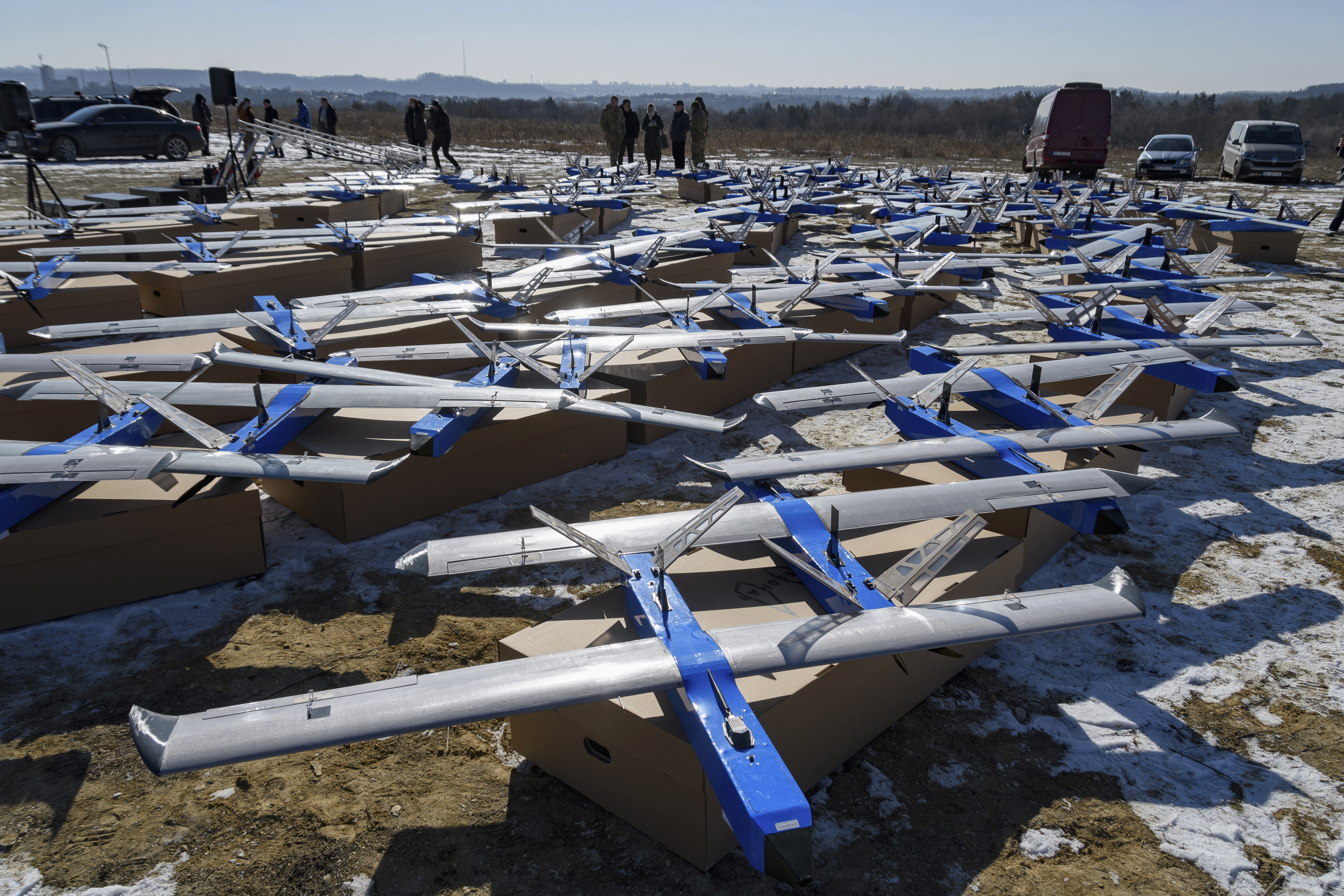 Ukrainian-made fixed-wing Besomar 3210 drone interceptors are handed over to the Armed Forces by Kozytskyi Charity Foundation in an undisclosed location in the Lviv region, western Ukraine, Friday, Feb. 21, 2025. (AP Photo/Mykola Tys)