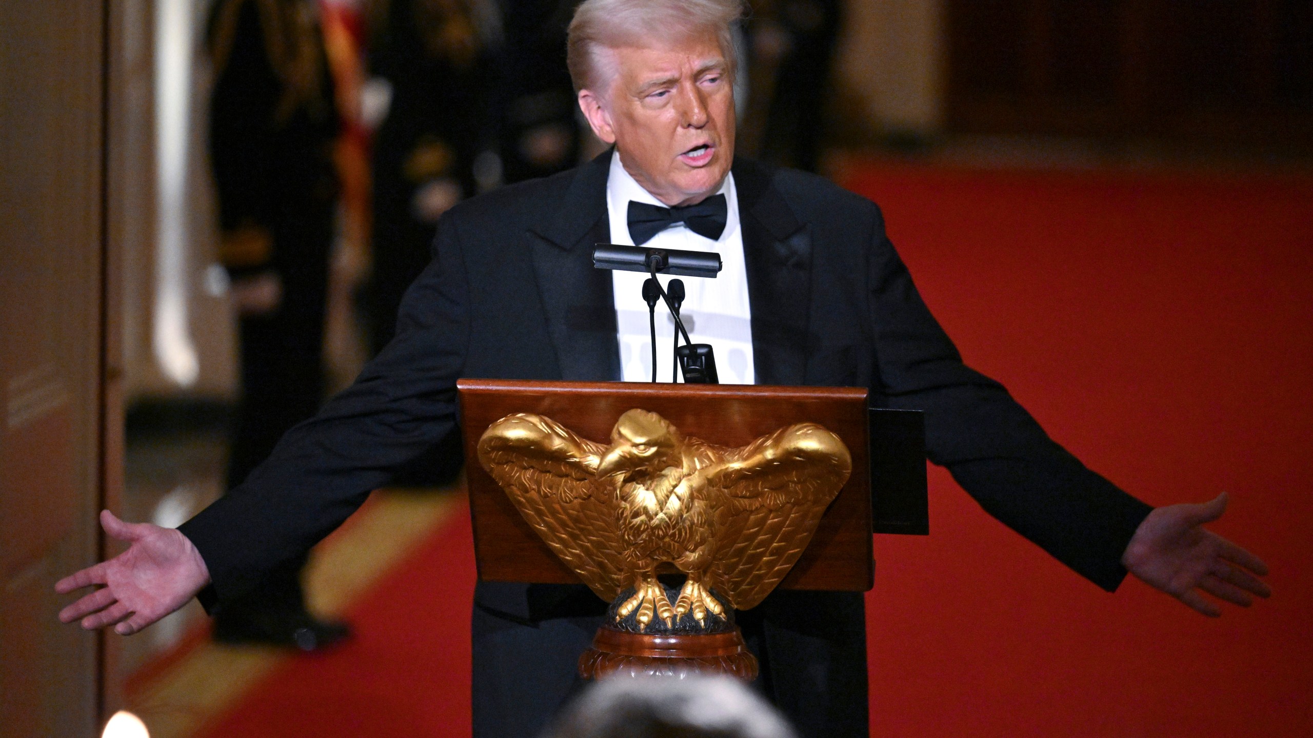 President Donald Trump addresses the National Governors Association dinner and reception in the East Room of the White House Saturday, Feb. 22, 2025, in Washington. (Pool via AP)