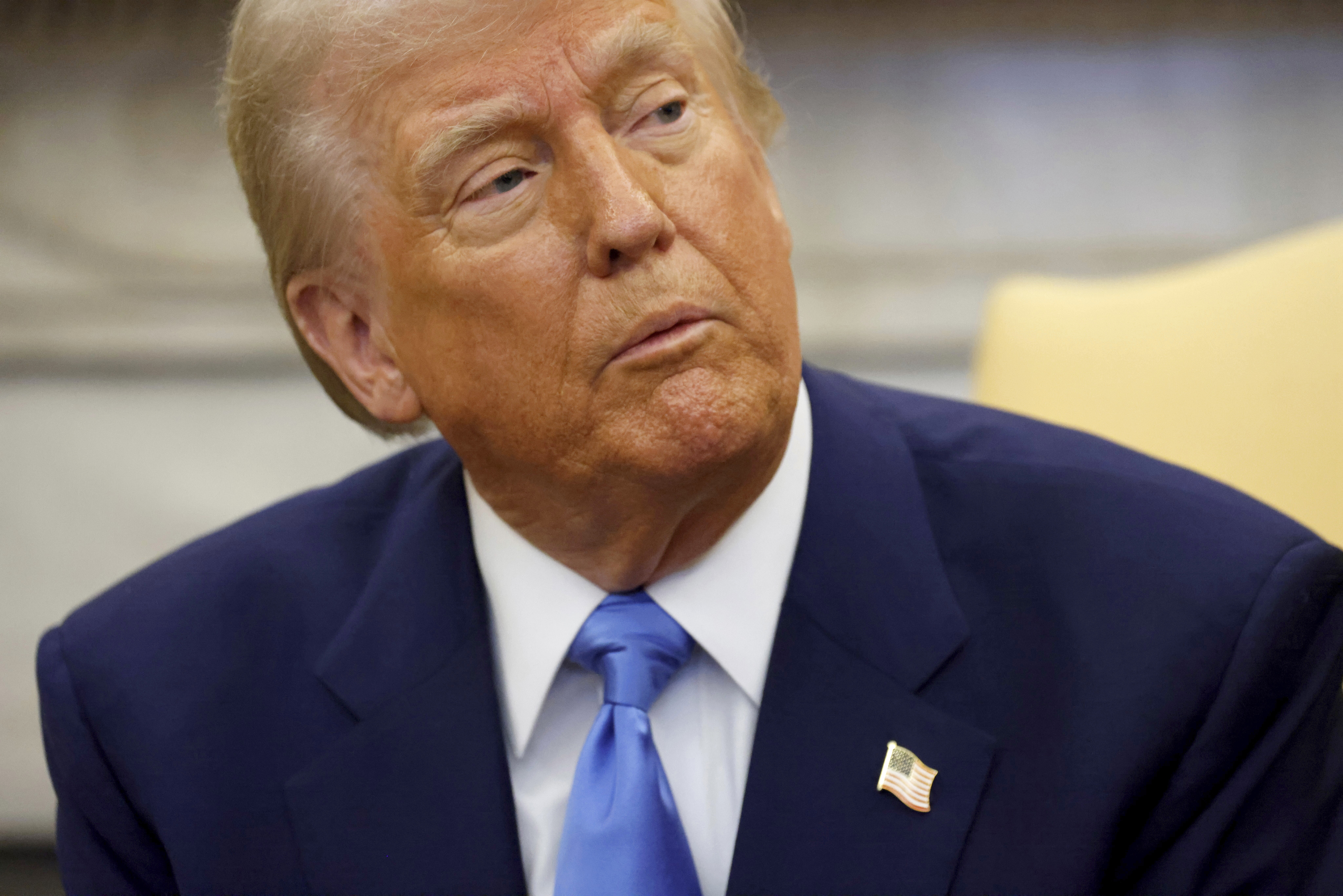 President Donald Trump speaks during a meeting with France's President Emmanuel Macron in the Oval Office of the White House in Washington, Monday, Feb. 24, 2025. (Ludovic Marin/Pool via AP)