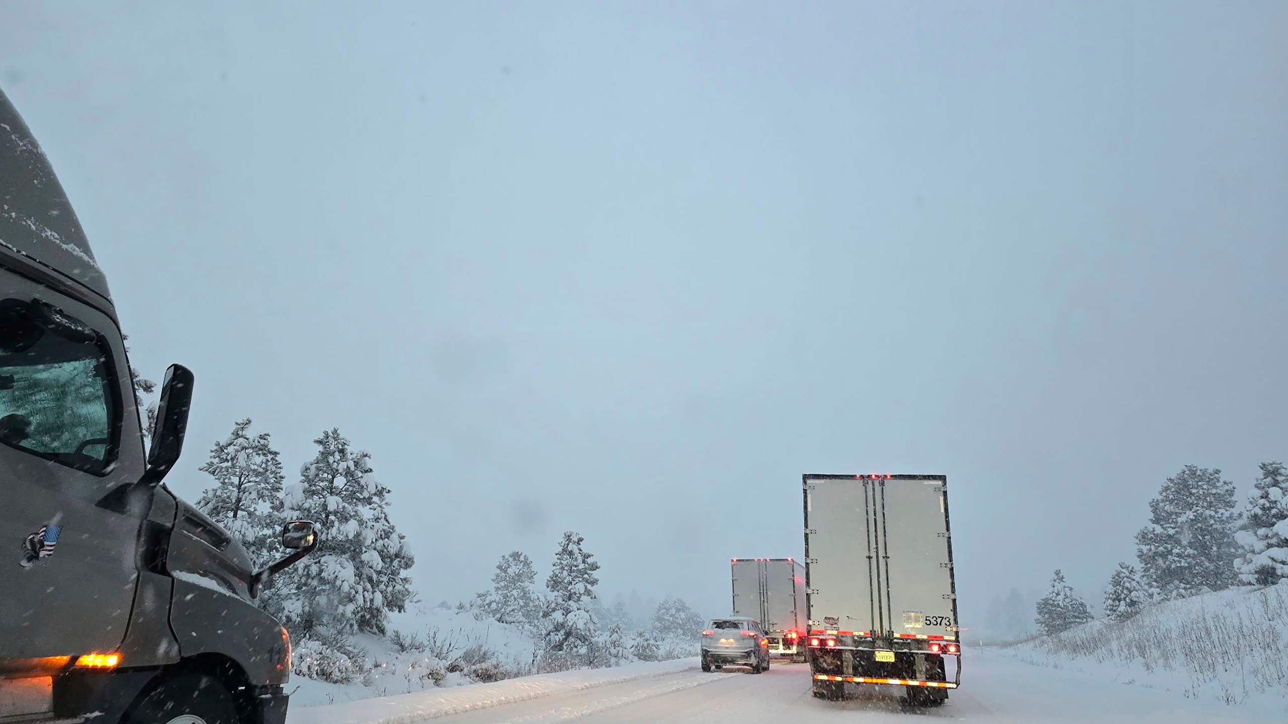 Traffic backed up for more than 15 miles on a westbound stretch of Interstate 40 between Flagstaff, Arizona, and Williams, Arizona on Friday, March 7, 2025. (AP Photo/Felicia Fonseca)