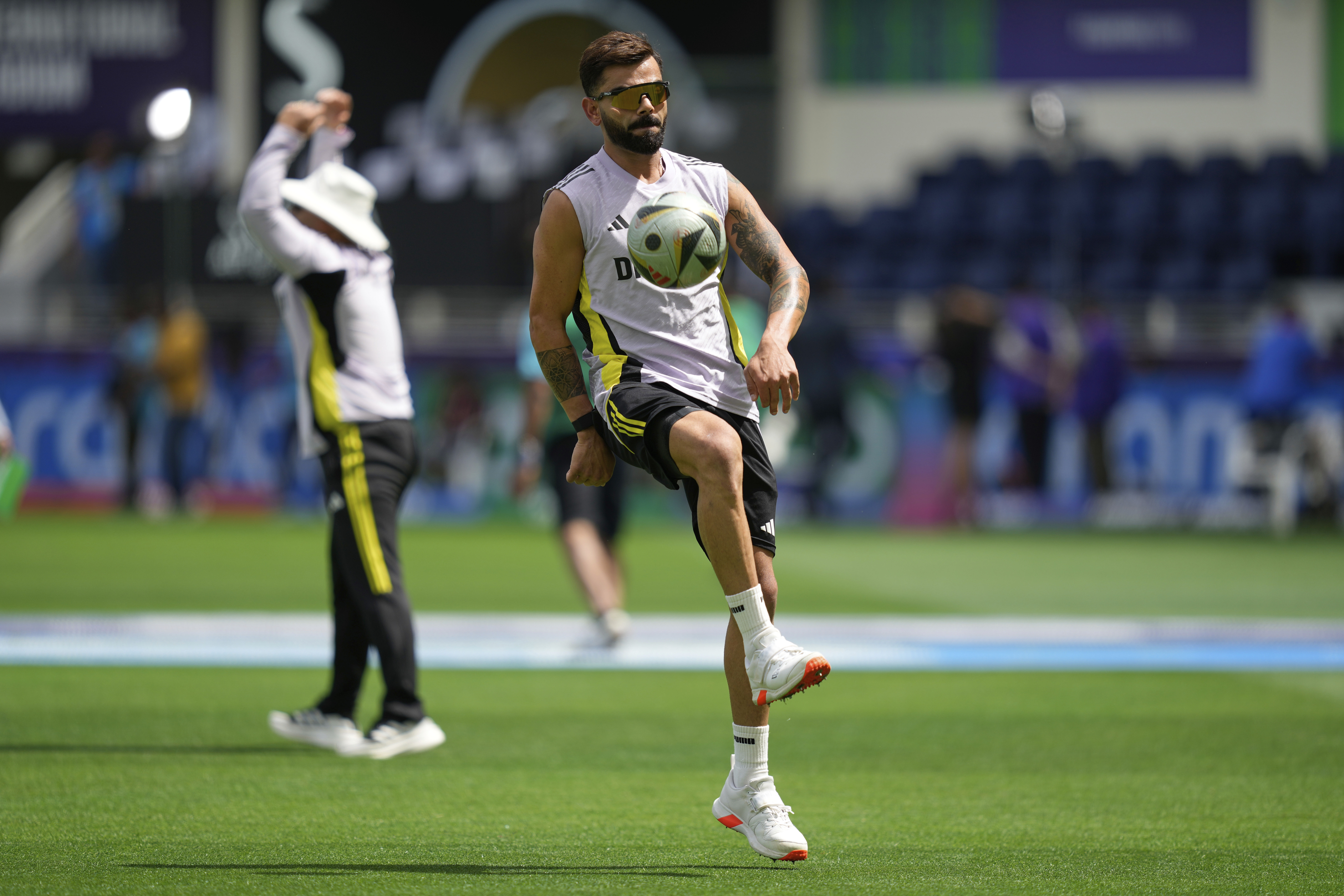 India's Virat Kohli trains ahead of the ICC Champions Trophy final cricket match between India and New Zealand at Dubai International Cricket Stadium in Dubai, United Arab Emirates, Sunday, March 9, 2025. (AP Photo/Altaf Qadri)